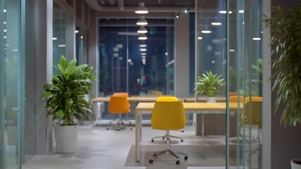 Modern office interior with business vibe and bright work space, glass wall, yellow chair, wooden desk, indoor plant, open plan layout night office business modern work space, empty desk