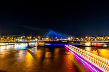 Obraz premium The blurred background of fireworks (light trails) is beautiful at night, seen in the New Year holidays, Christmas events, for tourists to take pictures during public travel.