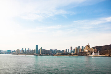 Fototapeta premium Blue Seaside City Skyline And Architecture