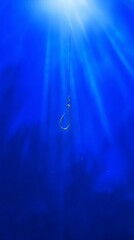 sinker. Close-up of a fishing hook submerged underwater with metallic reflections. lifestyle magazines, social media lookbooks, designed for influencer and brand collaborations.
