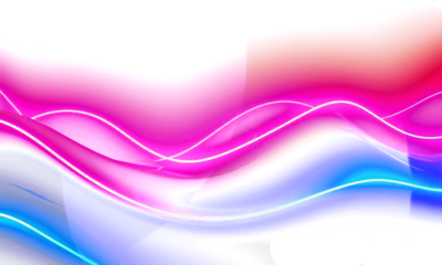 Vivid neon flowing waves blending pink, red, and blue light to create a dynamic futuristic abstract motion background design