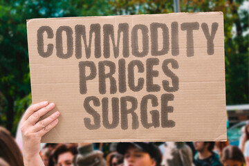"Commodity Prices Surge" Raw materials costs escalate. COMMODITY. PRICES. SURGE. RAW. ESCALATE.