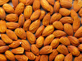 Fototapeta premium pile of walnuts as background