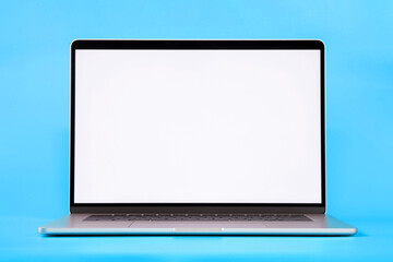 Laptop with blank empty white screen on blue background