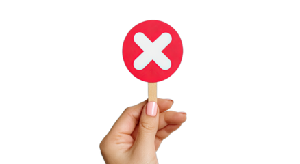 Hand holding red circle with white X, signifying incorrect or negative