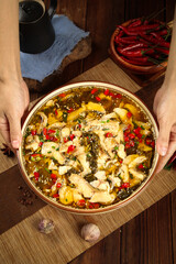 Spicy Chinese Fish Dish with Red Chilies and Pickled Vegetables