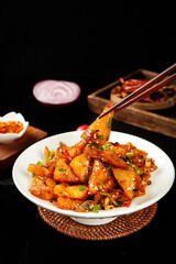 Spicy Chinese Tofu Stir-Fry Dish with Chopsticks