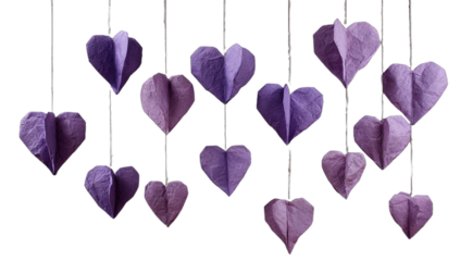 Delicate paper heart shapes hang in a cascading arrangement, creating a festive display