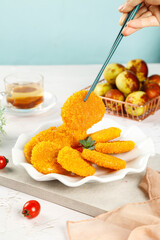 Crispy Fried Pumpkin Cake with Chopsticks - Chinese Deep Fried Dessert