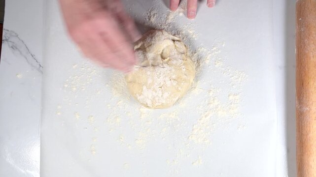 woman with roller pin working with dough
