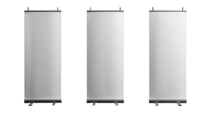 Three blank, silver roll-up banners stand upright on a black background
