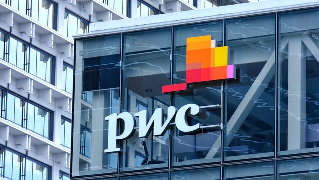 Closeup of PWC PricewaterhouseCoopers logo sign on office buildings in capital city Wellington, New Zealand Aotearoa - taken on 6th Dec 2025