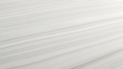 Soft white fabric folds on a light gray textured surface