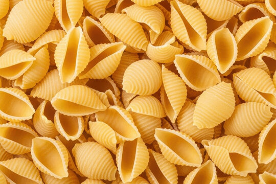Close-up shot of uncooked conchiglie pasta shells - Powered by Adobe
