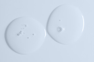 Transparent cosmetic product. Face serum or cleanser gel or body moisturizing gel.