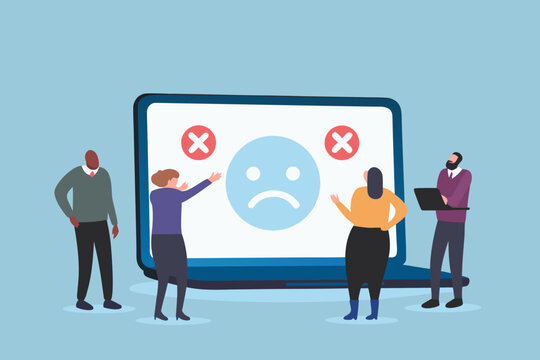 Team discussing negative feedback and customer dissatisfaction displayed on a laptop screen