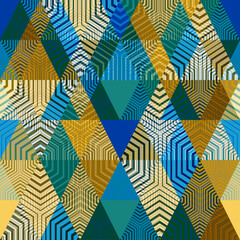 Seamless bright geometric pattern. Mustard, blue, turquoise diamonds and triangles.