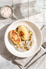 cutlets with mushroom puree and champignons