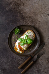 bruschetta with cottage cheese, poached egg and basil
