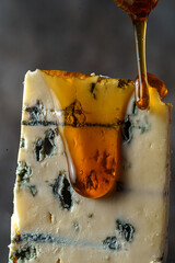cheese with blue mold dripping honey
