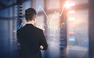 A business professional stands in an office space, closely analyzing financial data represented by dynamic graphs and charts that reflect stock market trends and opportunities. Scalp