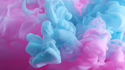 Colorful pink and blue ink swirling in water creating a soft abstract cloud-like formation.
