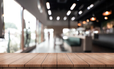Empty wooden table top with lights bokeh on blur restaurant background.