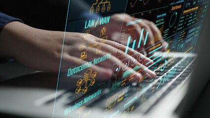 A professional scene showcasing hands typing on a laptop next to a high-tech screen displaying various network metrics and data visualizations, ideal for tech themes. Cipher