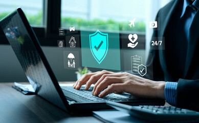 Insurance protection and financial security concept with businessman using calculator and writing document, digital icons of home, car, health, travel, family, shield, checklist, safety and assurance