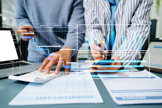 Project manager working and update tasks with milestones progress planning and Gantt chart scheduling diagram. business working with smart phone, tablet