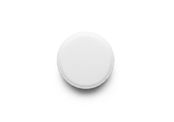 Plain white circular object positioned centrally against a bright background.
