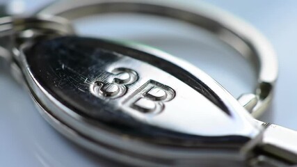 macro view of engraved numeric and alphabetic characters on polished metal surface