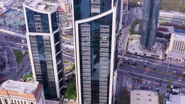 San Pedro Garza Garc&iacute;a, the richest city in Latin America, featuring skyscrapers and modern architecture - Drone View 4k