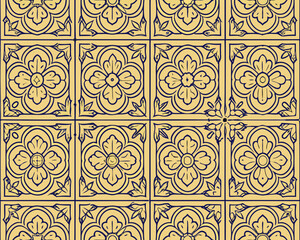 Intricate floral pattern of repeating blue tiles on a pale yellow background