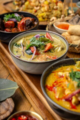 mix of traditional thai curries on restaurant table in phuket thailand