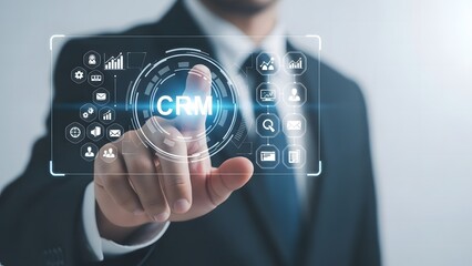 Business professional interacting with a digital crm interface and data network