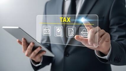 Man using tablet with digital tax icons overlayed on suit