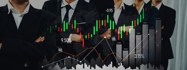 Group of business professionals in suits standing confidently with stock market visualizations...