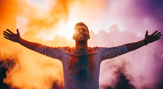A joyful man dancing and tossing colored powder into the air during Holi celebration. - Powered by Adobe