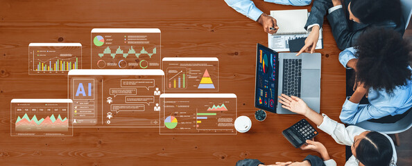 A diverse team engages in collaborative data analysis, utilizing digital dashboards and modern technology in a contemporary office setting. Trope