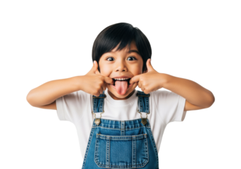 young boy in denim overalls stretching his mouth into a goofy grimace, tongue out, in a high-key medium close-up studio shot against a bright white background. concept of energetic childish humor