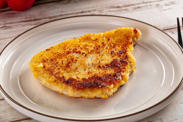 Breaded crispy chicken schnitzel