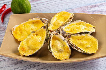 Baked oyster with parmesan cheese