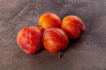 Ripe sweet juicy fresh purple plums