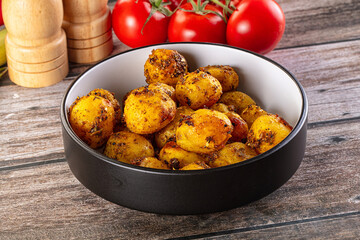 Baked small baby potato with herbs