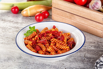 Italian fusilli pasta with tomatoes
