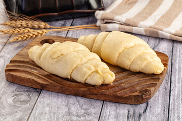 Raw uncooked croissant for bake