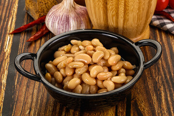 Baked white canned beans in the bowl