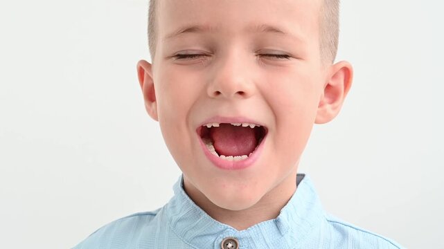 A child's smile during a tooth change. Close-up of a face, natural emotions.