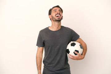 Young football player woman isolated on white background laughing